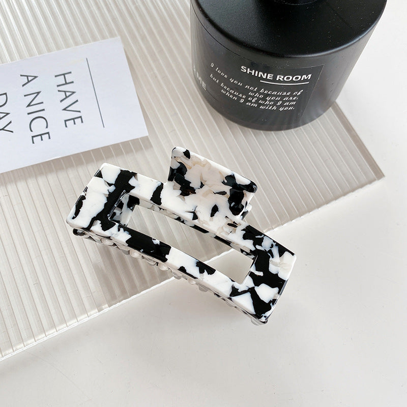 Wholesale Cow Black and White Medium Hollow Acetate Plate Hair Clips